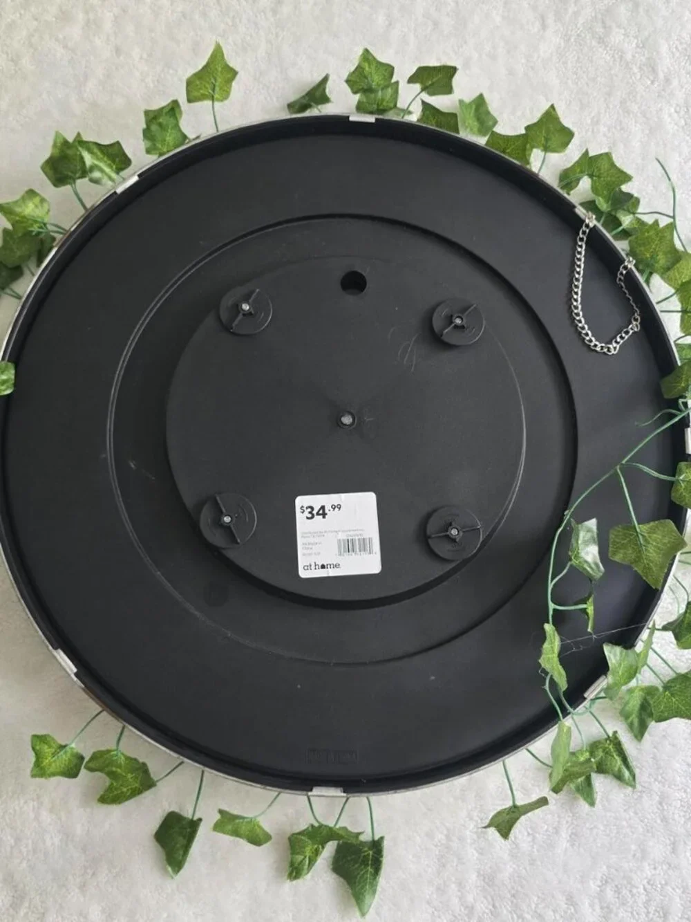 Faux ivy leaf circle mirror with chain detail